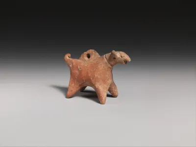 Terracotta dog (?) figurine with suspension hole