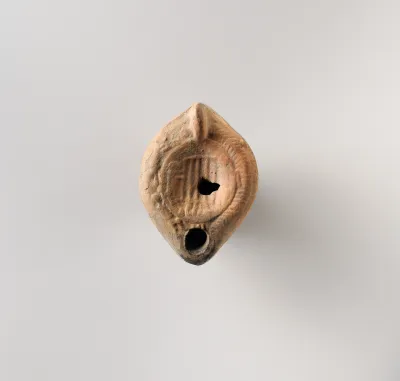 Terracotta oil lamp