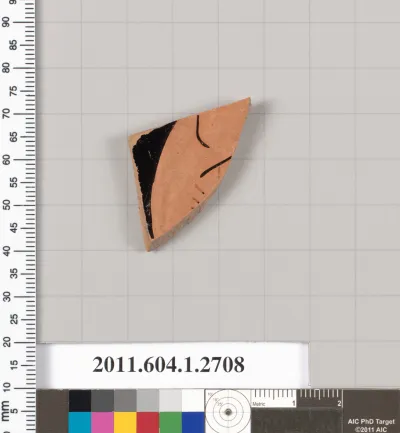 Terracotta fragment of a kylix (drinking cup)