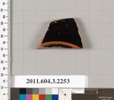 Terracotta fragment of a kylix (drinking cup)