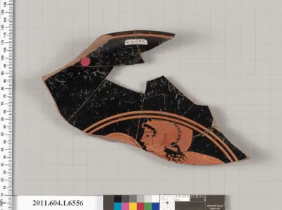 Terracotta fragment of a kylix (drinking cup)