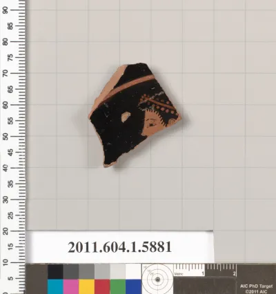 Terracotta fragment of a kylix (drinking cup)