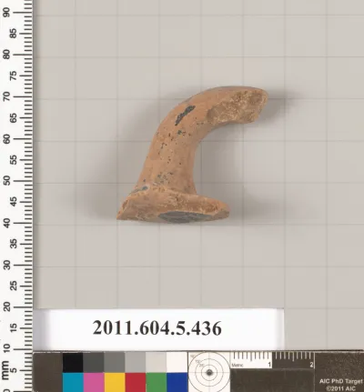 Terracotta fragment of a kylix (drinking cup)