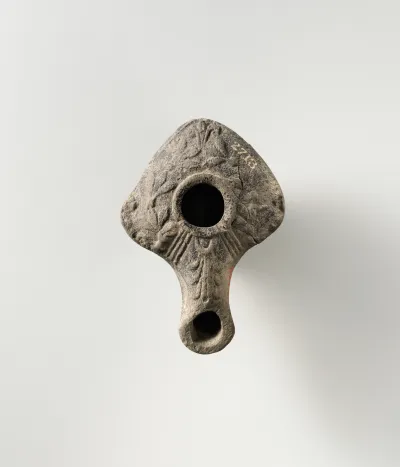 Terracotta oil lamp