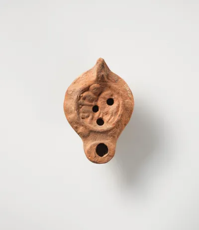 Terracotta oil lamp