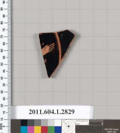 Terracotta fragment of a kylix (drinking cup)