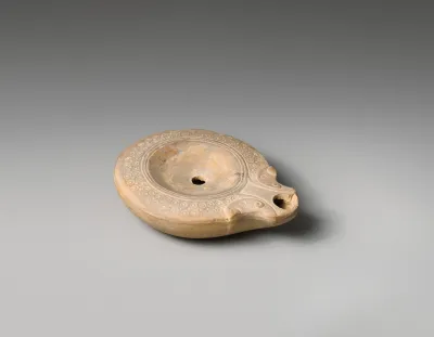 Terracotta oil lamp