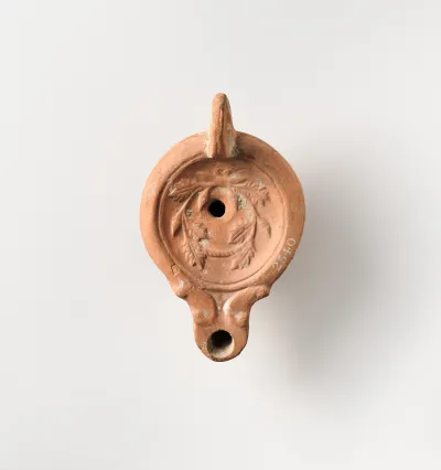 Terracotta oil lamp