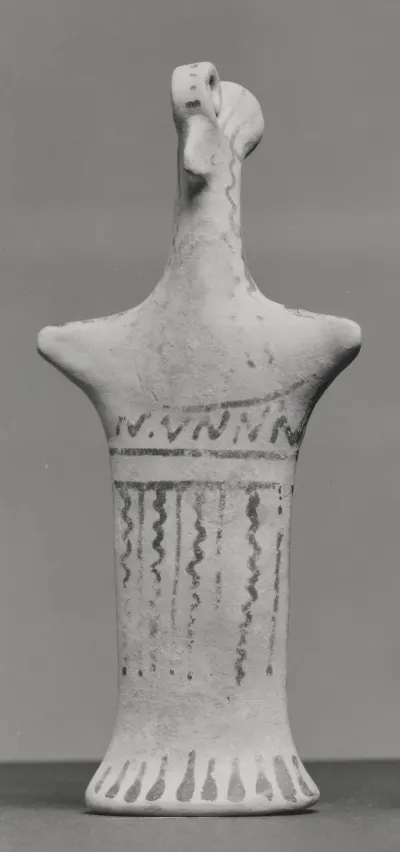 Figurine with Pinched Face and Geometric Decorations