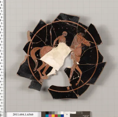 Terracotta fragment of a kylix (drinking cup)