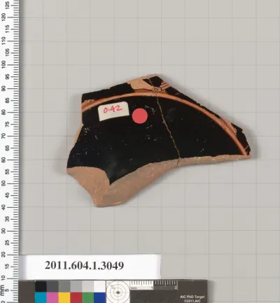 Terracotta fragment of a kylix (drinking cup)