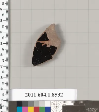 Terracotta fragment of a stemless kylix (drinking cup)