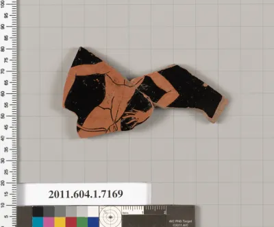 Terracotta fragment of a kylix (drinking cup)