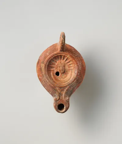 Terracotta oil lamp