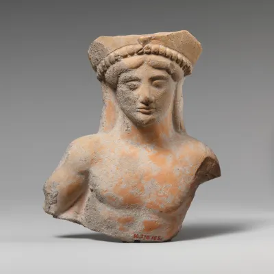 Terracotta relief of a reclining youth