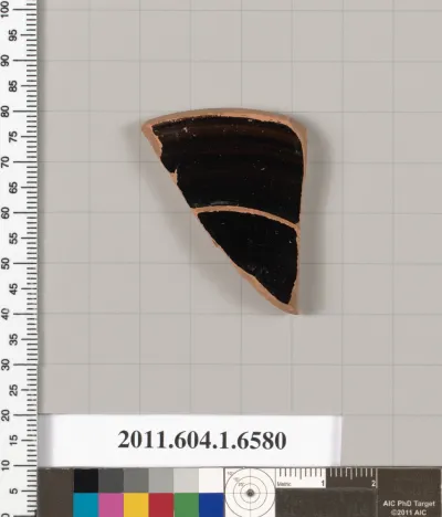 Terracotta fragment of a kylix (drinking cup)