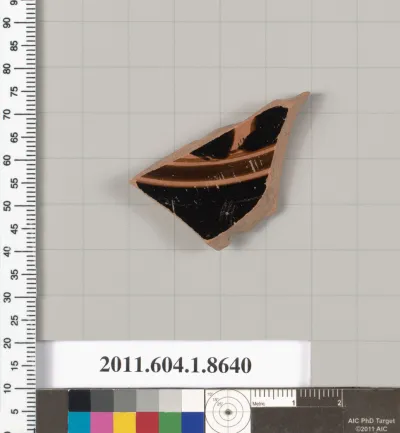 Terracotta fragment of a stemless kylix (drinking cup)