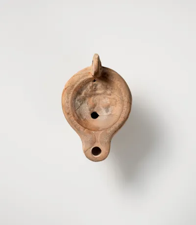 Terracotta oil lamp