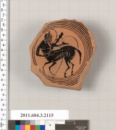 Terracotta fragment of a kylix (drinking cup)