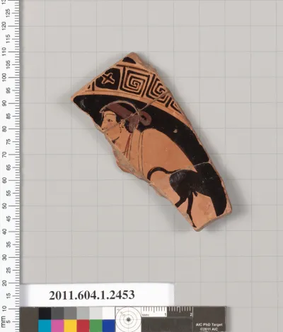 Terracotta fragment of a kylix (drinking cup)