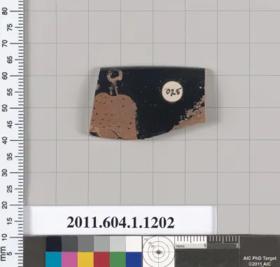 Terracotta rim fragment of a kylix (drinking cup)