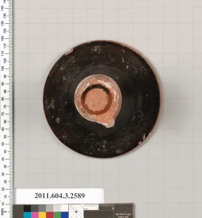 Terracotta fragment of a kylix (drinking cup)