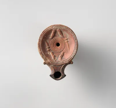 Terracotta oil lamp