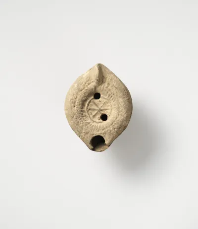 Terracotta oil lamp