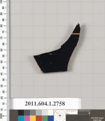 Terracotta fragment of a kylix (drinking cup)