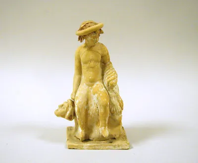 Terracotta statuette of a seated youth