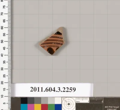 Terracotta fragment of a kylix (drinking cup)