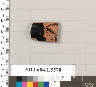 Terracotta rim fragment of a kylix (drinking cup)