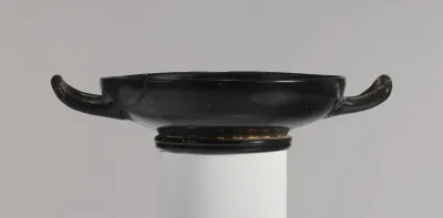 Terracotta stemless kylix (drinking cup)