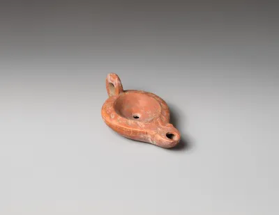 Terracotta oil lamp