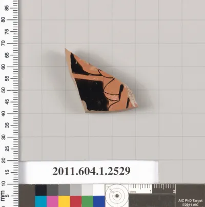Terracotta fragment of a kylix (drinking cup)