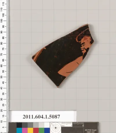 Terracotta fragment of a kylix (drinking cup)