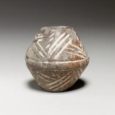 Terracotta biconical spindle-whorl with flat top