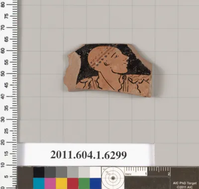 Terracotta rim fragment of a kylix (drinking cup)