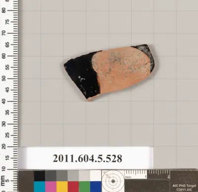 Terracotta fragment of a kylix (drinking cup)