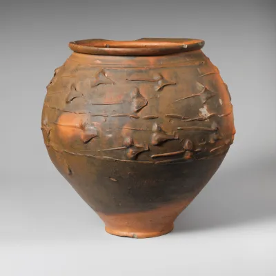 Terracotta jar with barbotine decoration
