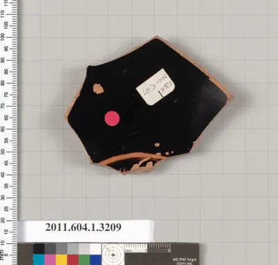 Terracotta fragment of a kylix (drinking cup)