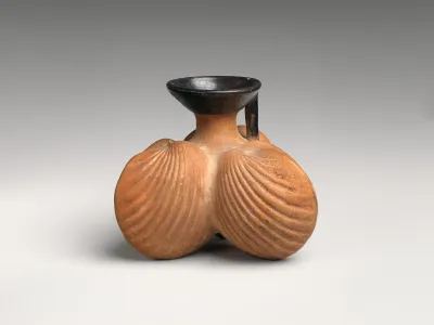 Terracotta aryballos (oil flask) in the form of three cockleshells