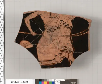 Terracotta fragment of a kylix (drinking cup)