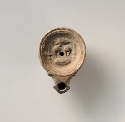 Terracotta oil lamp