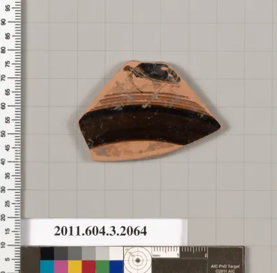 Terracotta fragment of a kylix (drinking cup)