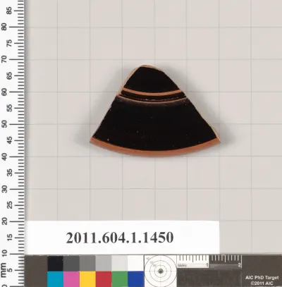 Terracotta fragment of a kylix (drinking cup)