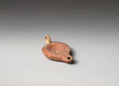Terracotta oil lamp