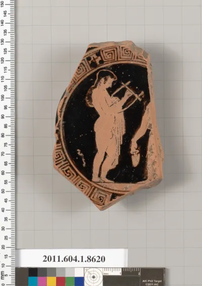 Terracotta fragment of a stemless kylix (drinking cup)