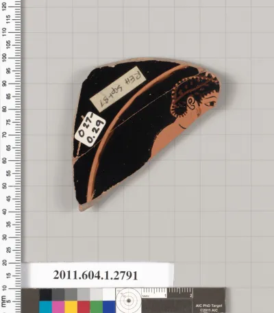 Terracotta fragment of a kylix (drinking cup)