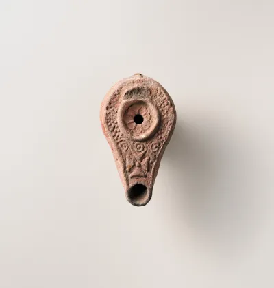 Terracotta oil lamp